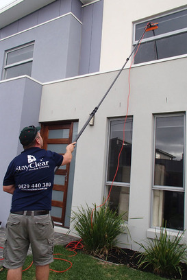 window cleaner in Littlehampton South Australia using a water fed pole