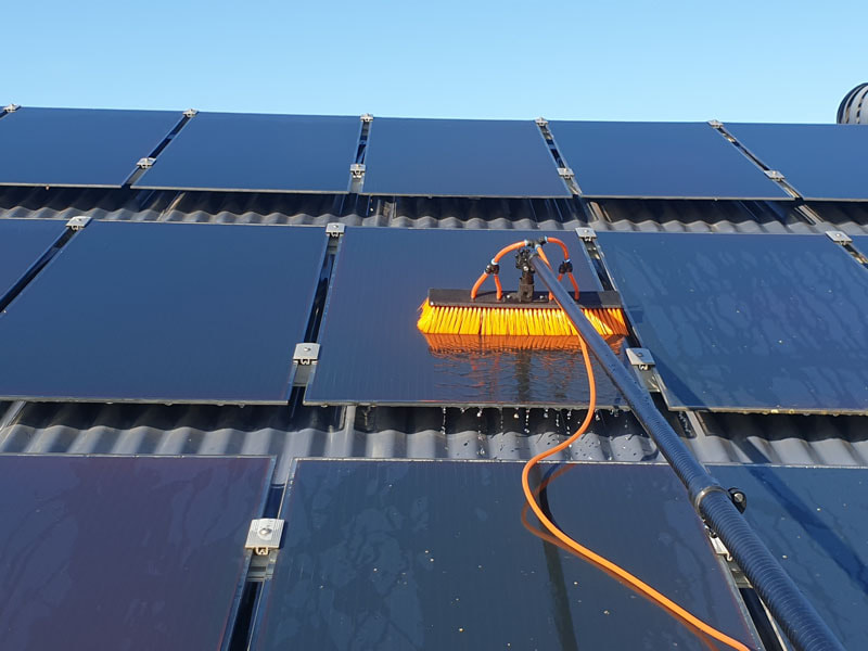 Cleaning latest solar panels on a home in Hervey Bay
