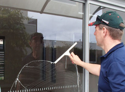 Window clean Toogoom, Queensland with squeegee