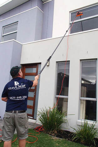 Safety beach window cleaner using water fed pole